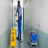 Man Mopping a Floor